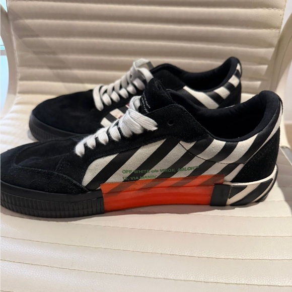 Off-White Black and White Striped Sneakers with Orange Accent
